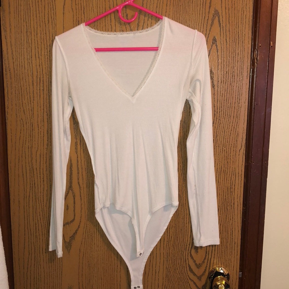 Long sleeve white body suit